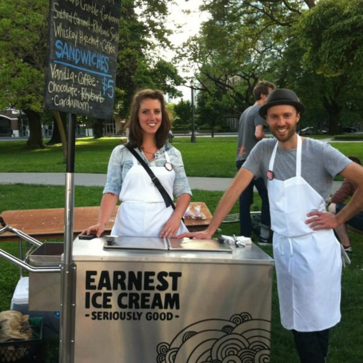 Founders of Earnest Ice Cream at the beginning, wiith rolling cart to sell ice cream at farmer's markets.